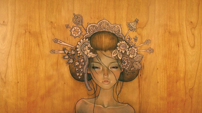 Girl with elaborate headdress on wood grain background
