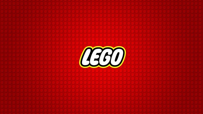 Lego logo on red brick background