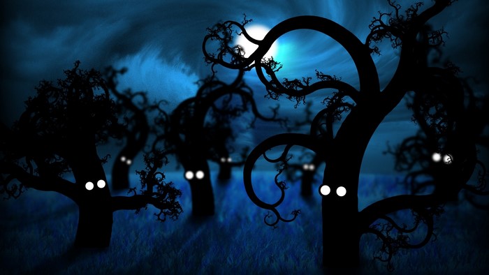Spooky forest with glowing eyes at midnight