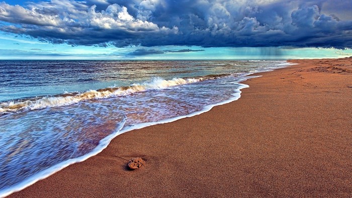 Seaside with stormy clouds