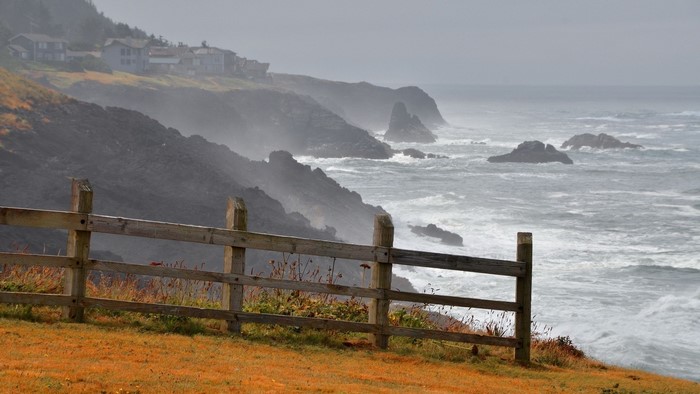 Coastal homes on a cliff overlooking the sea