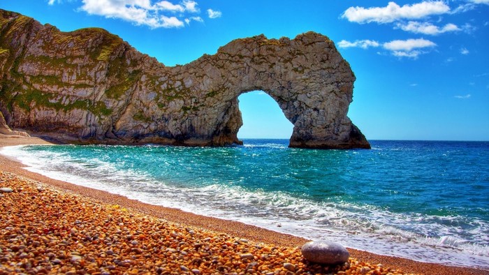Durdle Door rock formation on a sunny day