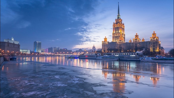 Moscow Cityscape with Frozen River at Dusk