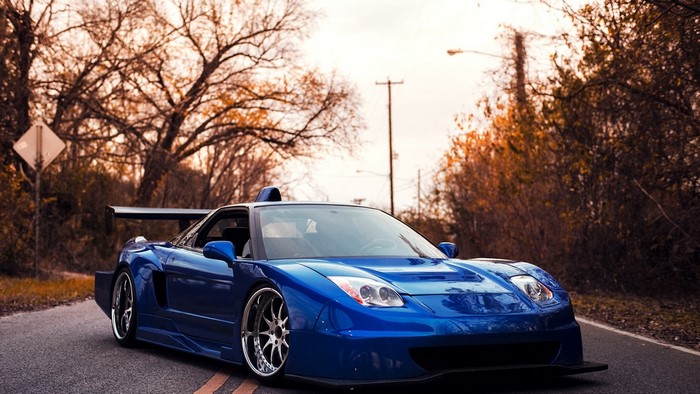 Blue Acura NSX with a large rear spoiler