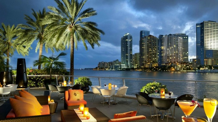 Miami waterfront restaurant patio at dusk