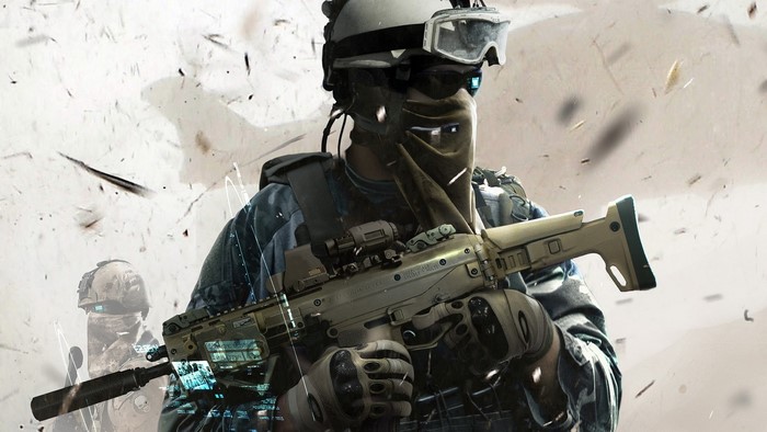 Soldier with rifle in desert environment