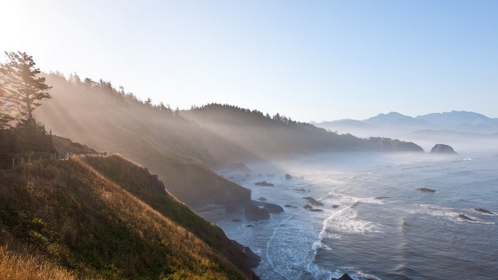 Oregon Coast Sunrise with Fog and Mountains