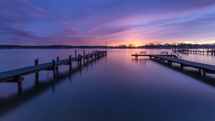Sunset over still water with docks in Maryland