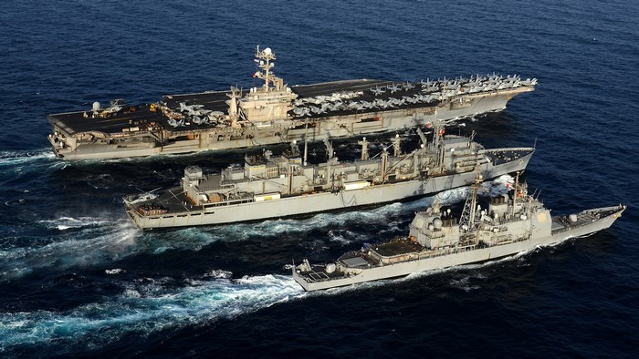 US Navy Aircraft Carrier and Support Ships at Sea