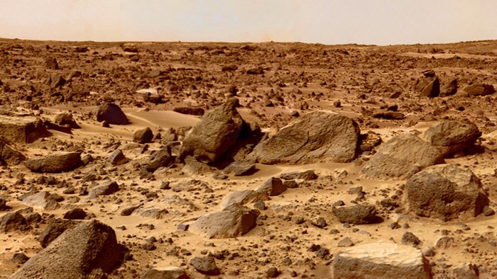 Surface of Mars with rocks and sand