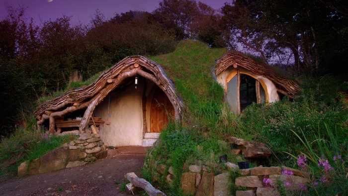 Hobbit house built into a grassy hill