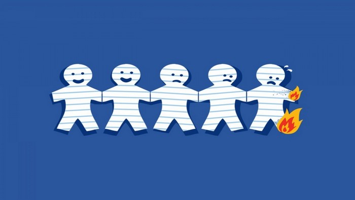 Paper people chain on blue background