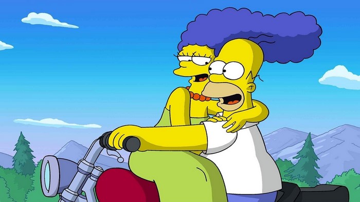 Homer and Marge Simpson riding a motorcycle