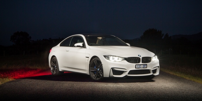 White BMW M4 Coupe Pure Edition at Night