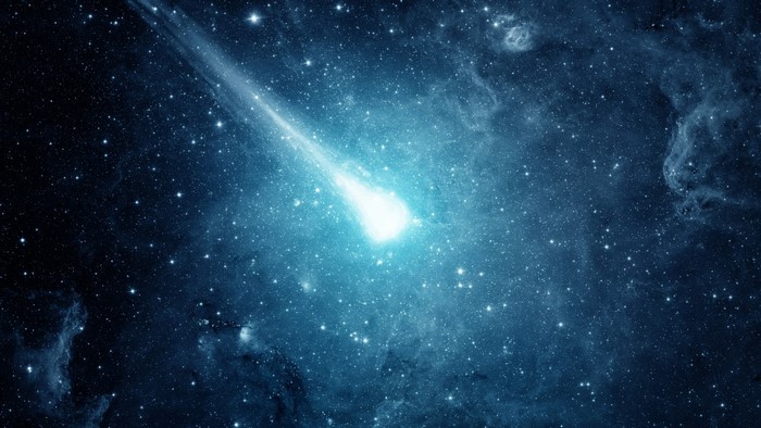Blue Meteor Streaking Through Starry Cosmos