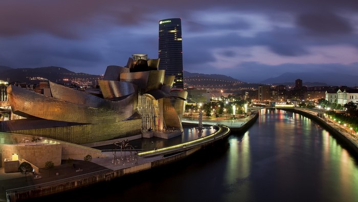 Guggenheim Museum and Bilbao cityscape at night