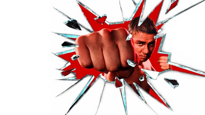 Man punching through broken glass