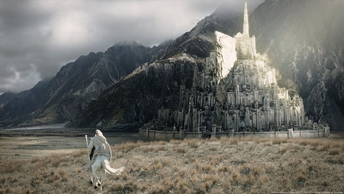 Gandalf on horseback approaching Minas Tirith from Lord of the Rings