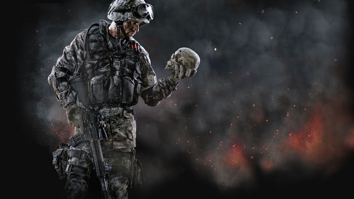Soldier holding a skull in a smoky battlefield