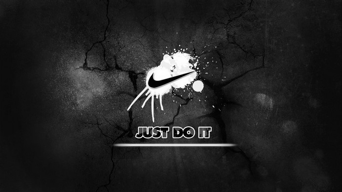 Nike Just Do It logo on cracked background