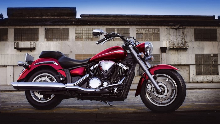 Red Yamaha XVS 1300A Cruiser Motorcycle