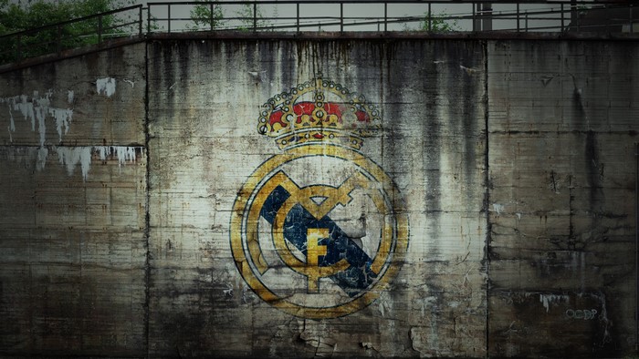 Real Madrid logo on a concrete wall