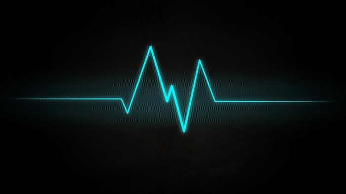 Cyan EKG Line on Black Background