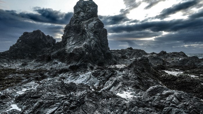 Rocky coastline with dramatic clouds