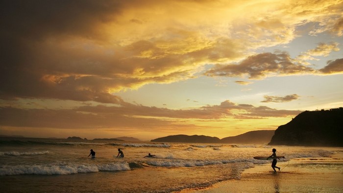 Surfers at Sunset Beach
