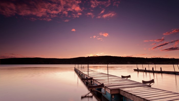 Pink Sunrise Over Lake With Wooden Dock