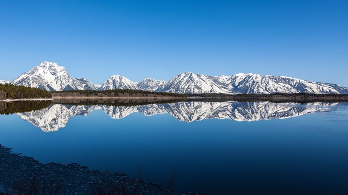 Grand Teton Mountains reflected in a lake
