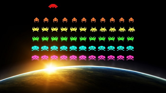 Space Invaders aliens over Earth