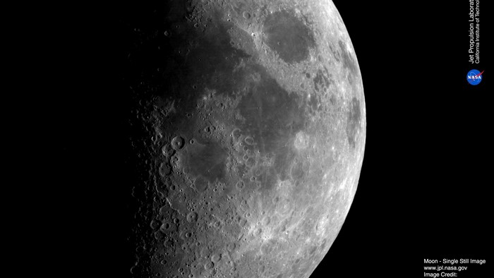 Moon surface with craters and NASA logo