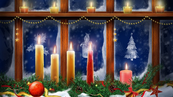 Christmas window with candles and decorations