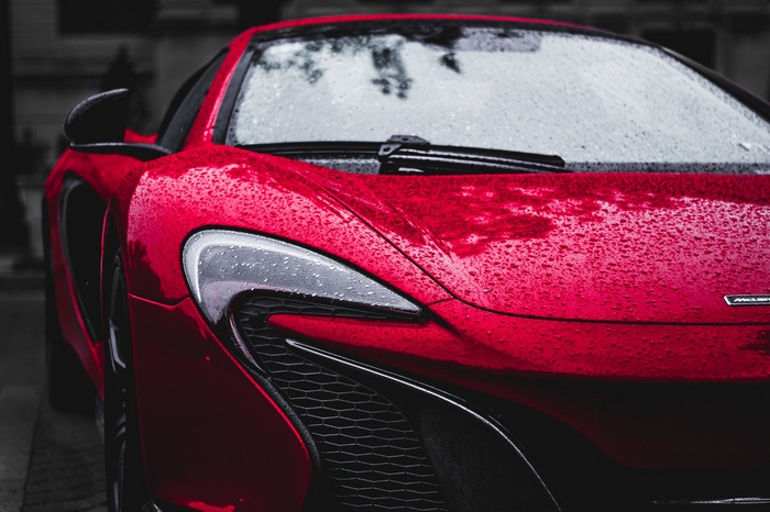 Red McLaren P1 Sports Car in Rain