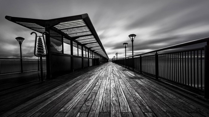 Black and White Pier with Long Exposure Sky