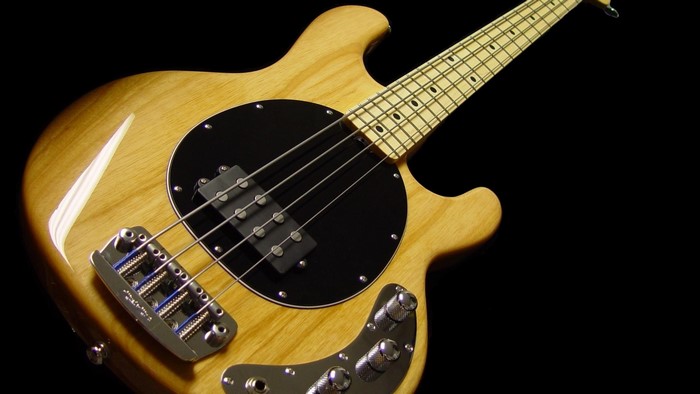 Natural wood 4-string bass guitar