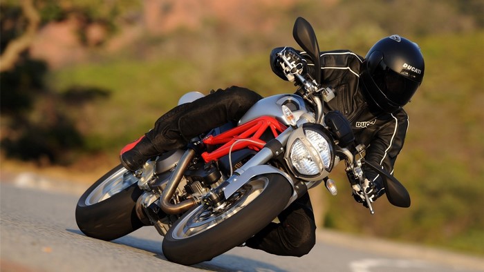 Ducati motorcycle rider on a road