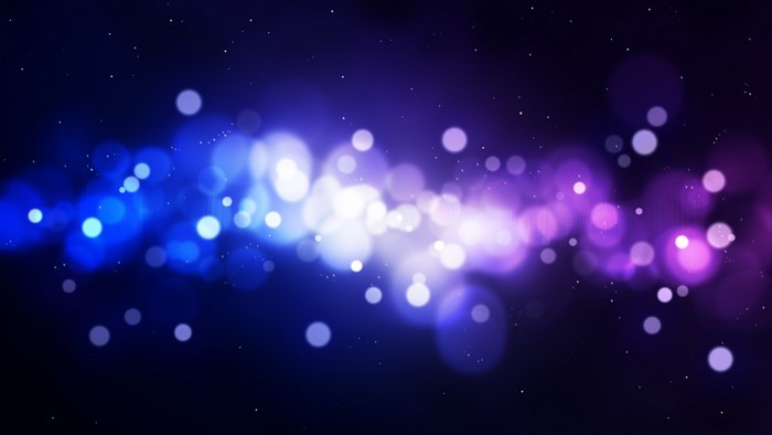 Blue and purple bokeh lights with stars