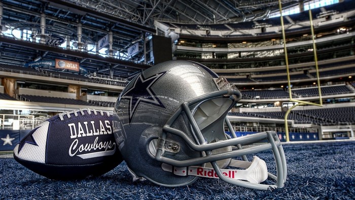 Dallas Cowboys Helmet and Football in Stadium