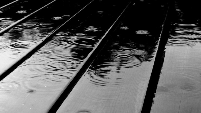 Raindrops on wooden planks