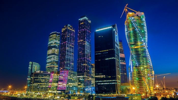 Night Cityscape with Colorful Illuminated Skyscrapers