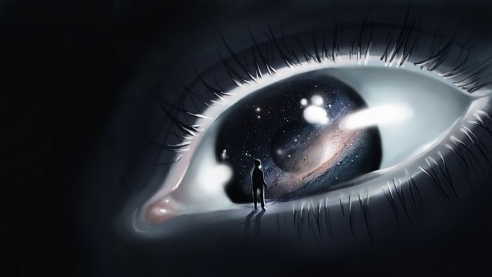 Galaxy reflected in an eye with a person