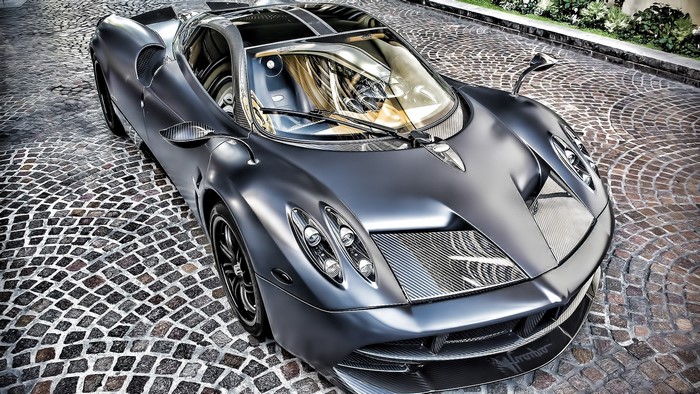 Matte gray Pagani Huayra on cobblestone street