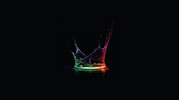 Colorful water splash on black background