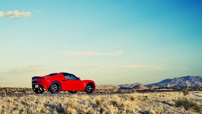 Red Lotus car in a desert landscape
