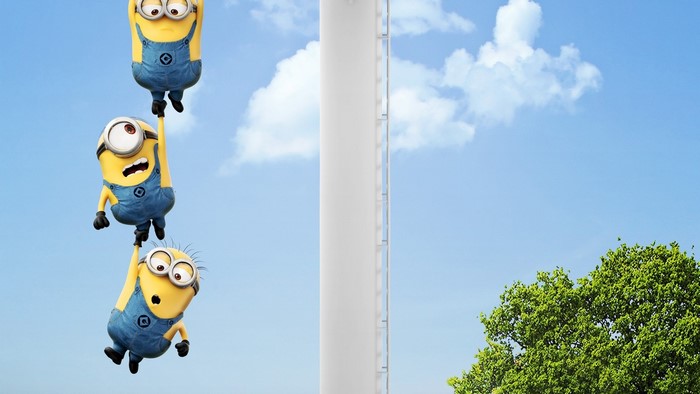 Minions from Despicable Me 2 hanging from a tower