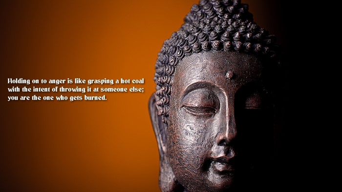 Buddha statue with quote about anger