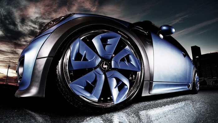 Blue Mini Cooper with custom wheels