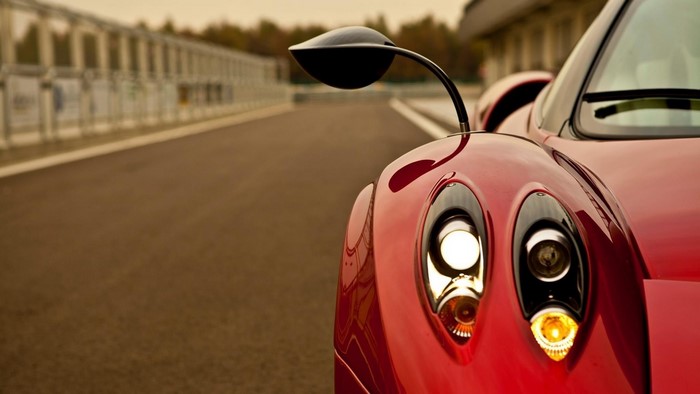 Red Pagani Huayra on a Racetrack